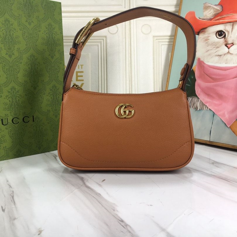G*u*i top handle bags